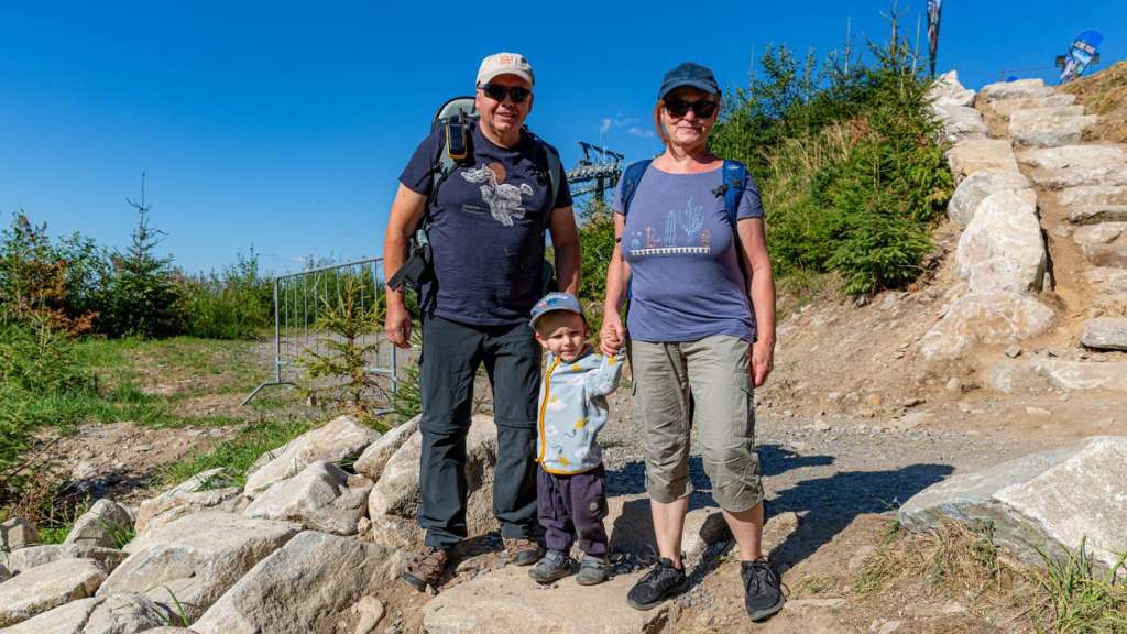 Family photo at the top of stone steps